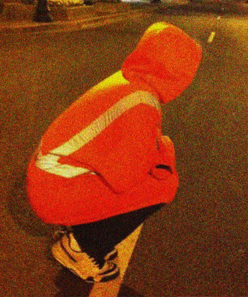 « Human Road Cone » (photo of Bryan Lewis Saunders by Robby Simpson)